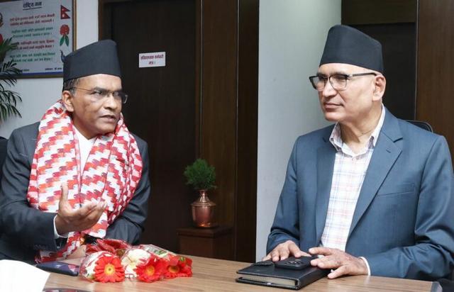 Newly Appointed Governor Dr. Bishnu Paudel Meets Finance Minister Bishnu Prasad Paudel